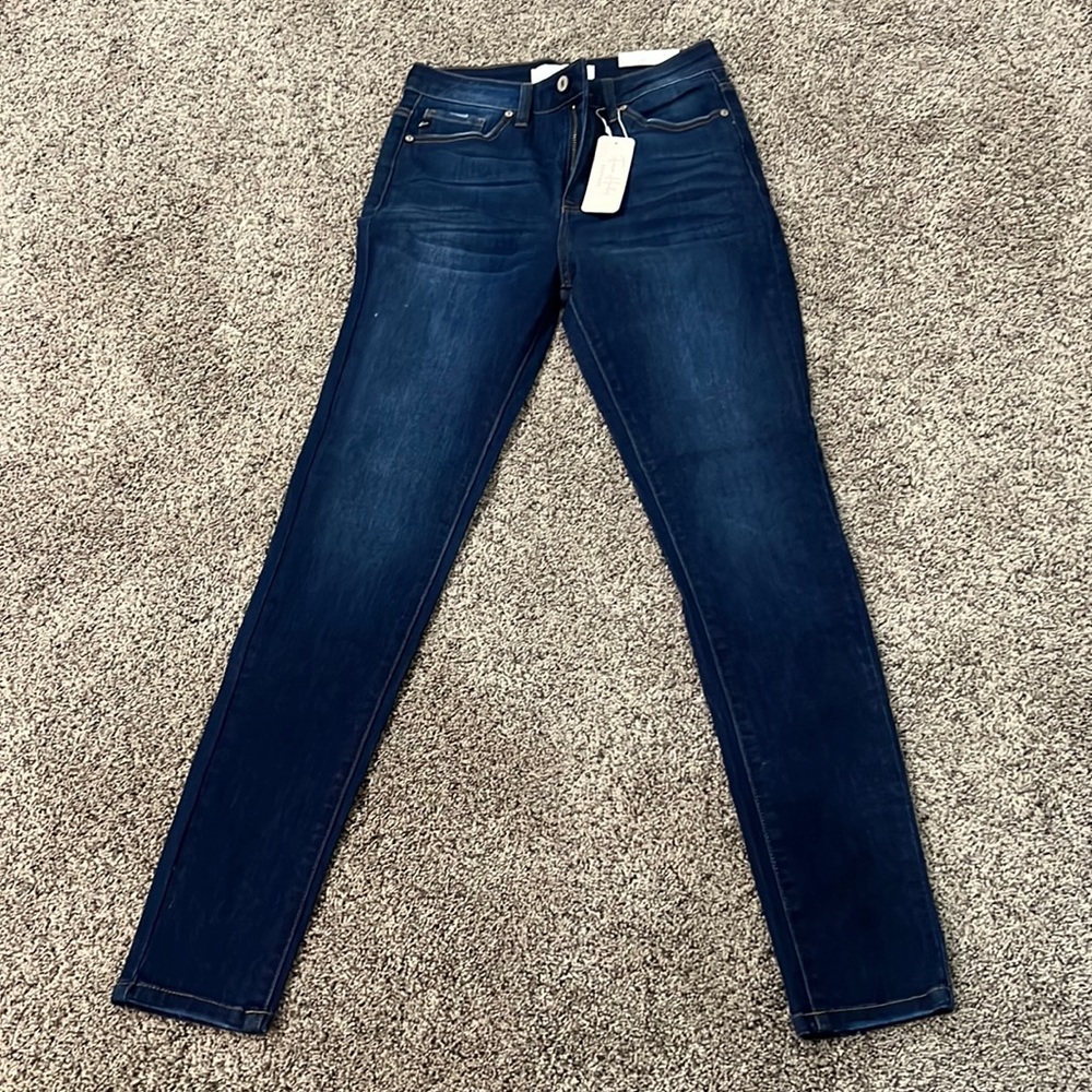 high rise skinny jegging material like jeans no rips size 5/26 dark wash